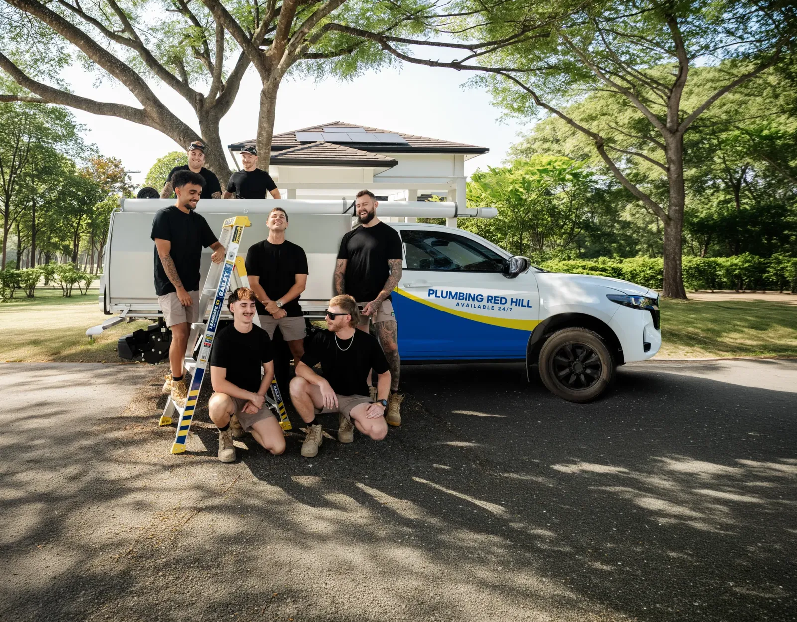 Plumbing Red Hill ute and team